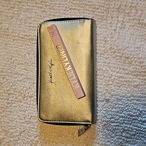 NWOT Never used Kendall and Kylie Silver Wallet!